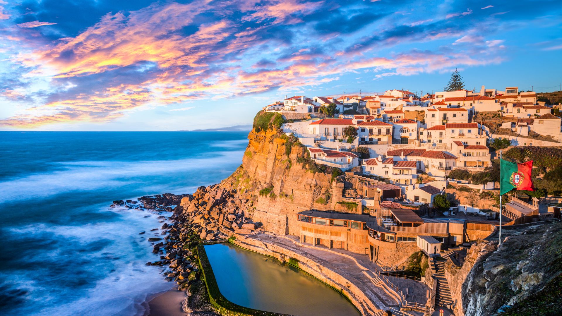 Coastal village with stunning sunset view