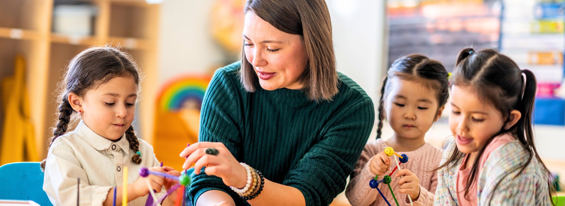Teacher with children engaging in activities